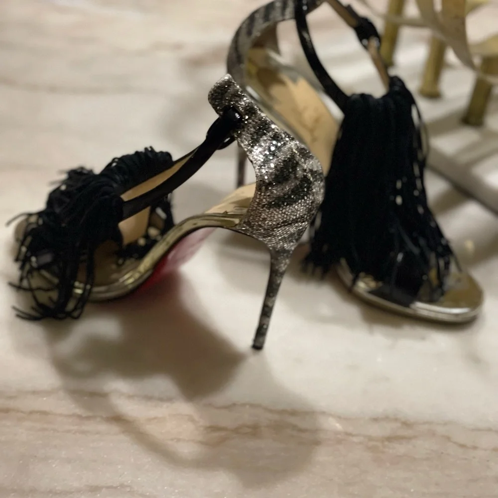 Christian Louboutin Silver Heels with Black Tassels - Picture 2 of 7